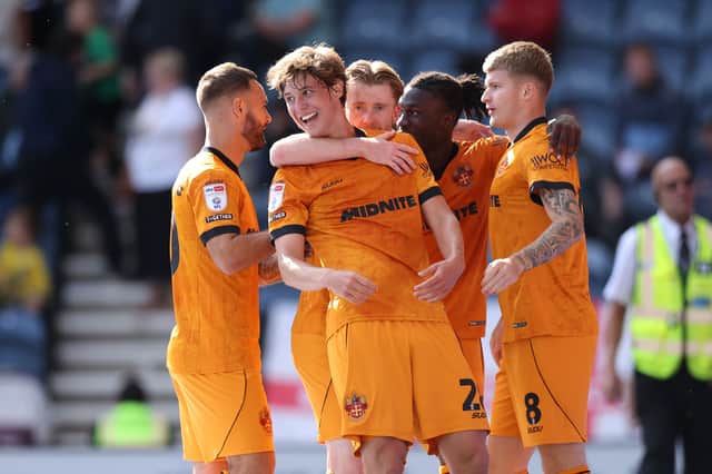 Fer Lopez celebrates with team-mates after scoring against Preston
