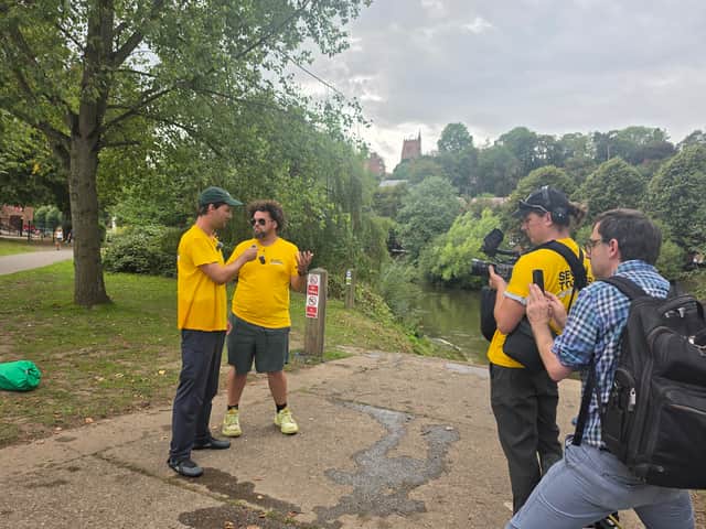 Local chef influencer Adam Purnell being interviewed after paddling