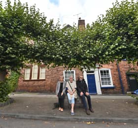 Cleobury Gardeners members, Flo Hadley, and Steve and Iris Todd, with Cleobury Mortimer's Pleached Lime Trees.