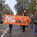 Jamie Russell, right, taking part in the protest on November 1, 2023.