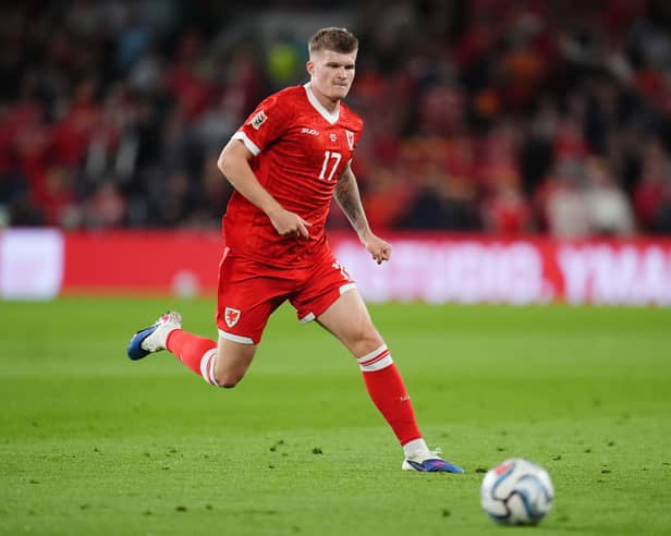 Jordan James in action for Wales