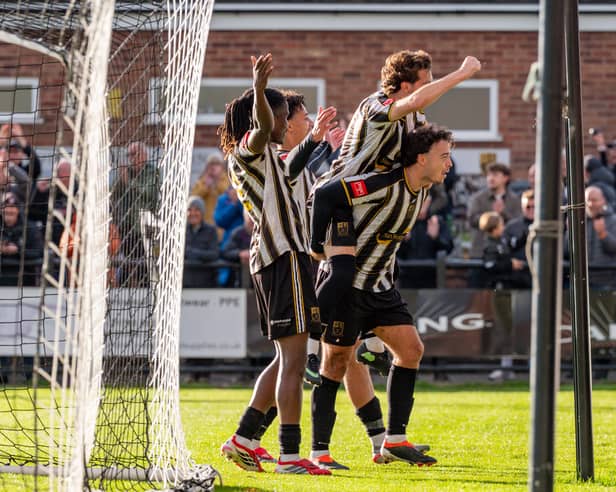 Stafford Rangers celebrate scoring during their win over Mossley 