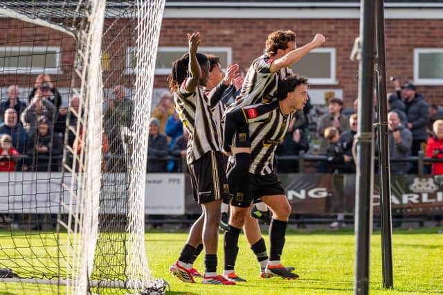 Stafford Rangers celebrate scoring during their win over Mossley