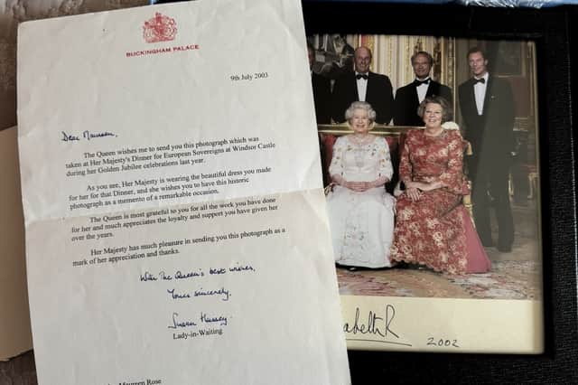 A photo of the visit with European heads of state with Queen Elizabeth II wearing the ivory embroidered dress made by Maureen Rose