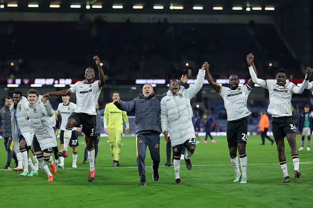 Wolves players celebrate their comeback win over Burnley