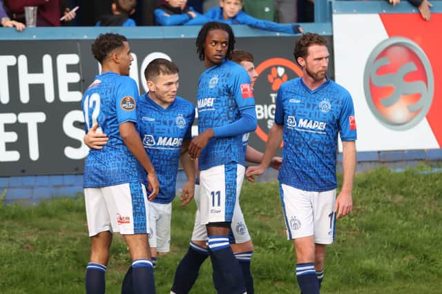 Halesowen Town's Jason Cowley celebrates with team-mates after the penalty winner over Hitchin