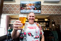 Peter Hill from West Bromwich has forked out around £336,0000 drinking on the world's longest pub crawl has celebrated reaching his 25,000th boozer.