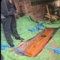 Church apologises to grieving Wolverhampton family after father's coffin 'left exposed' in shallow grave