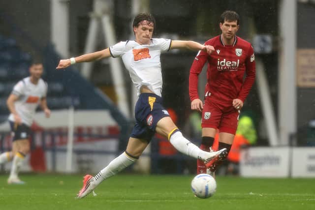 Albion’s Chris Mepham in action in the Preston rain.

Photographer Rich Linley / CameraSport

