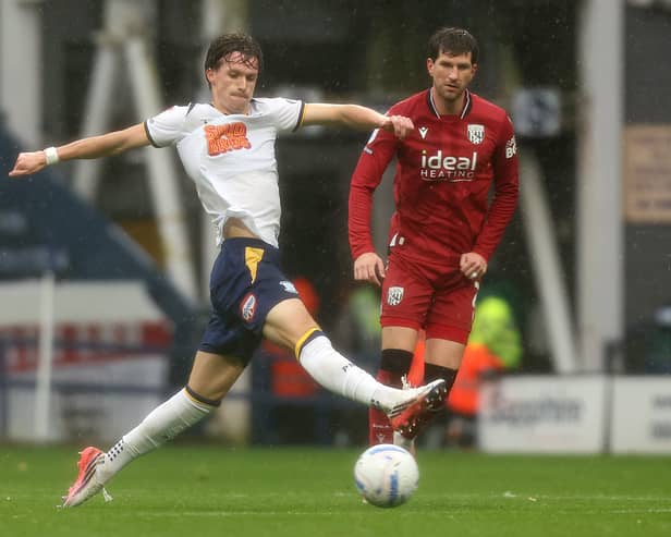 Albion’s Chris Mepham in action in the Preston rain.

Photographer Rich Linley / CameraSport

