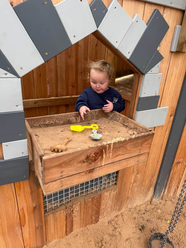 Tommy playing in the new sandpit