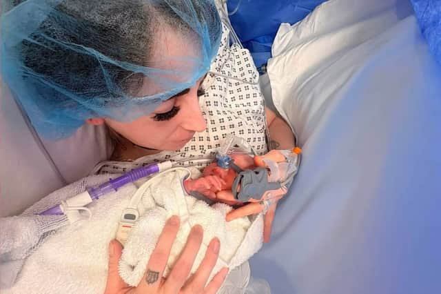 Laura with baby Samson shortly after his birth.