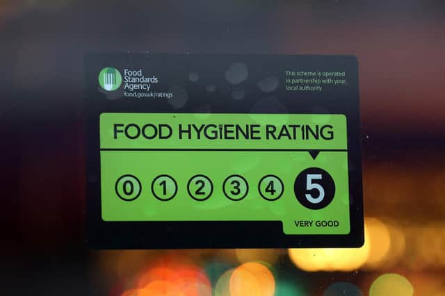 A Food Standards Agency rating certificate is pictured in the window of a restaurant. Claims have been made that some restaurants are ignoring food hygiene standards ratings. (Photo by Carl Court/Getty Images)