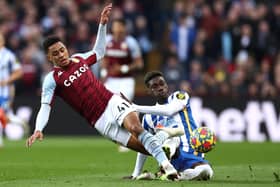 Brighton's Yves Bissouma challenges Aston Villa's Jacob Ramsey in the Seagulls' 2-0 defeat at Villa Park. Pic: Ryan Pierse