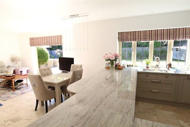 The Zoopla listing says the property benefits from a 'luxuriously' appointed kitchen/family room with bi folding doors to the garden. SUS-220202-153200001