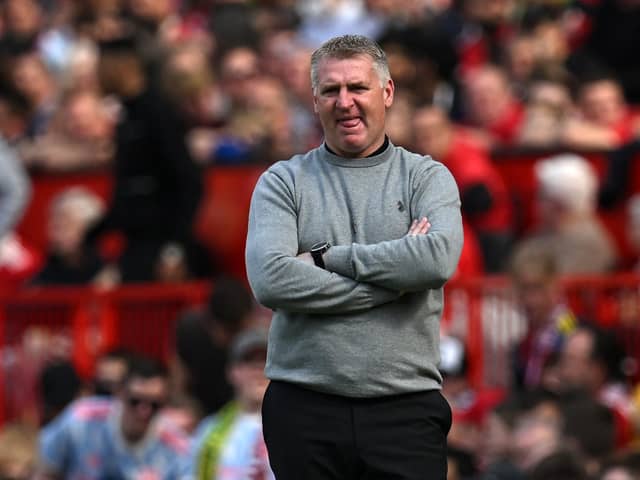 Norwich City's English head coach Dean Smith looks on during the English Premier League football match between Manchester United and Norwich City at Old Trafford in Manchester, north west England, on April 16, 2022.