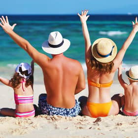 File photo of a family at the beach. Picture: Adobe stock