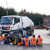 Four protestors were arrested by police following the protests in Hedge End and New Forest. Pictured is a group of activists from Just Stop Oil blocking the route of a tanker, as they blockade the ESSO Birmingham Fuel Terminal, Birmingham. Picture date: Friday April 1, 2022. Picture: Joe Giddens/PA Wire.