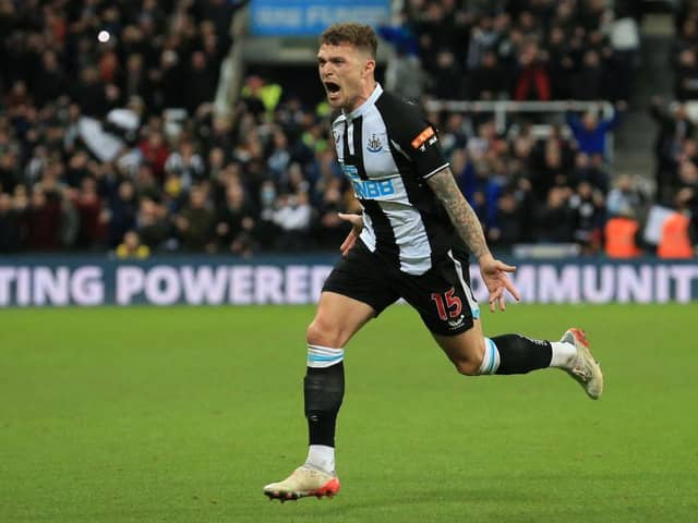 Newcastle United's English defender Kieran Trippier celebrates after scoring their third goal from a freekick during the English Premier League football match between Newcastle United and Everton at St James' Park in Newcastle-upon-Tyne, north east England on February 8, 2022.  (Photo by LINDSEY PARNABY/AFP via Getty Images)