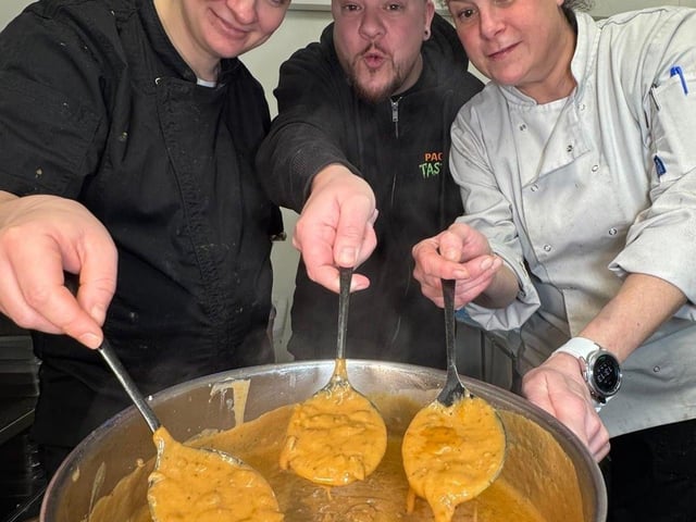 Rachel Griffiths, Chris Hardy and Gemma Hughes making the pies in the Fleur de Lys kitchen.