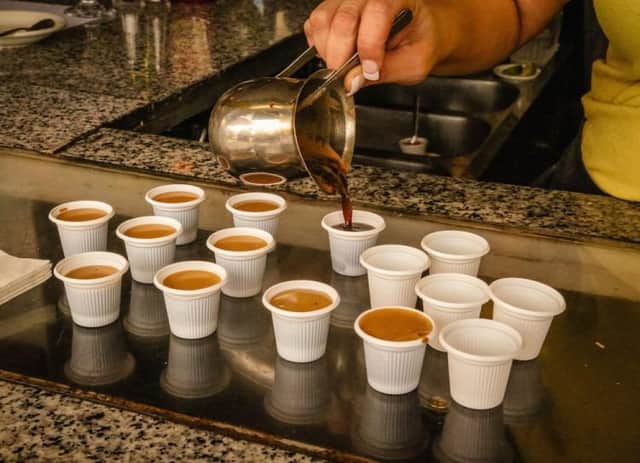 A stop to sample the unique taste of Cuban coffee during a food and cultural tour in Little Havana with Miami Culinary Tours. Image: Miami Culinary Tours