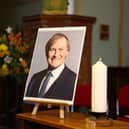 A portrait of David Amess MP ahead of a service at St Michael's Church in Chalkwell