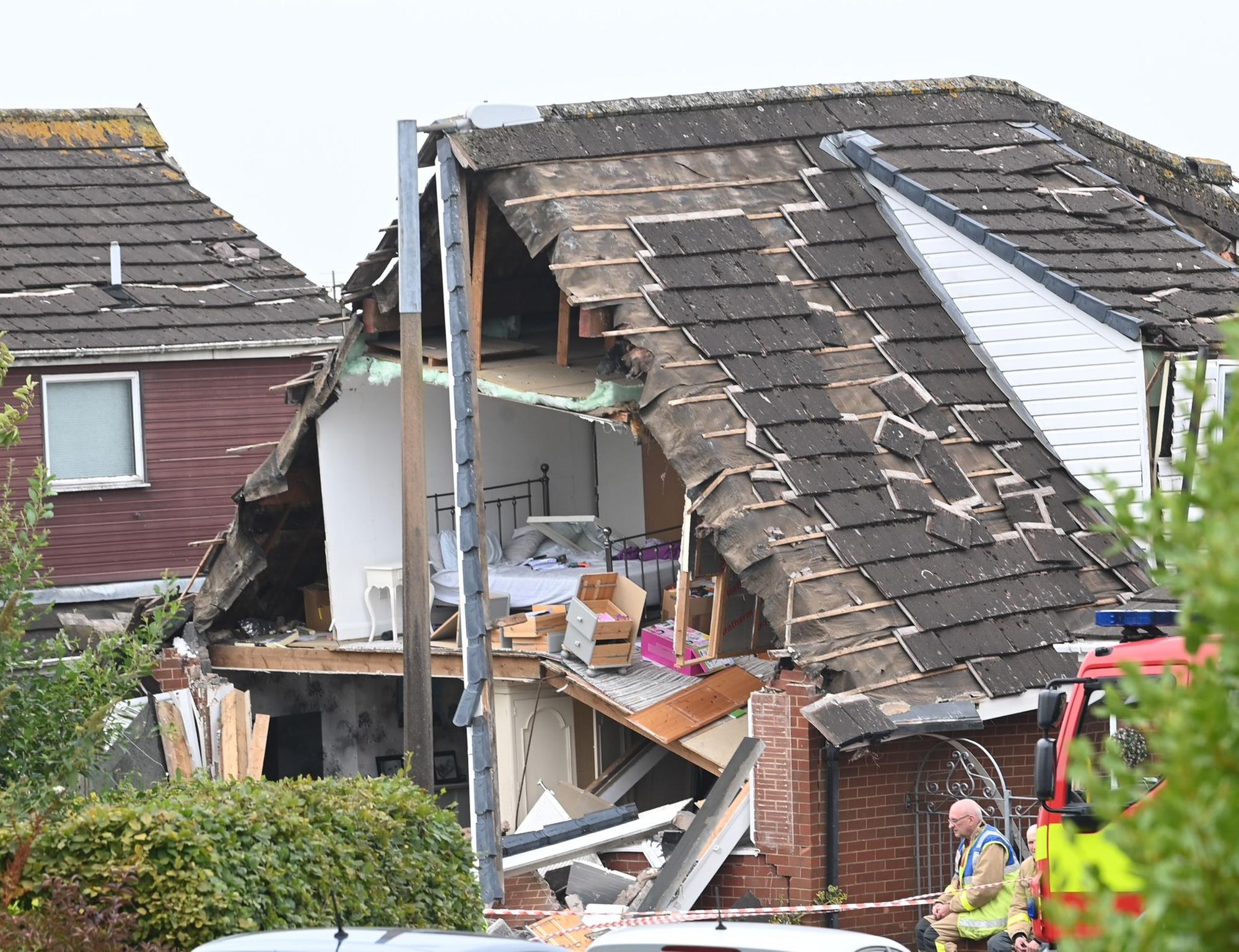 Devastating footage shows house with front blown off after suspected gas explosion