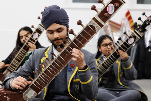 Sitar players from Services For Education's Raga and Tala Ensemble
