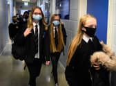 Under new guidance, pupils in Year 7 and above as well as visitors and staff, are being "strongly advised" to wear face masks in communal areas (Photo by ANDY BUCHANAN/Digital/AFP via Getty Images)