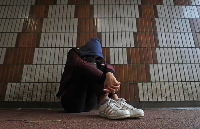 PICTURE POSED BY MODEL File photo dated 02/02/20 of a teenage girl showing signs of mental health issues. Families with children at risk of going into care or with experience of care will share in £3 million of cash support to help them with current pressures. Issue date: Saturday February 5, 2022.