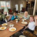 Mercia Grange invites pupils from Little Sutton Primary School to make waffles.