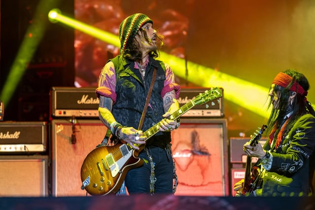 Hollywood Vampires members Johnny Depp and Tommy Henriksen on stage at the Utilita Arena in Birmingham on Tuesday, July 11, 2023. Photo by David Jackson.