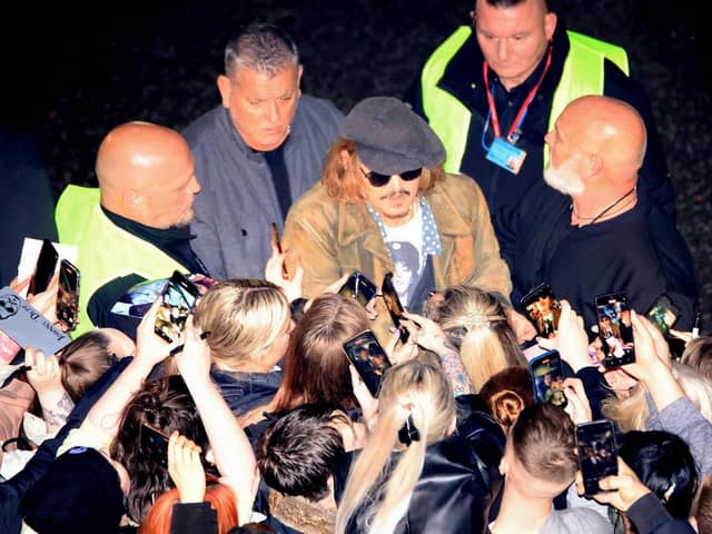 Fans were seen rallying around Johnny to get a photo. Picture: North News.