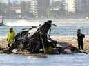 Two helicopters collided on the Australian Gold Coast, killing several passengers and critically injuring three others.