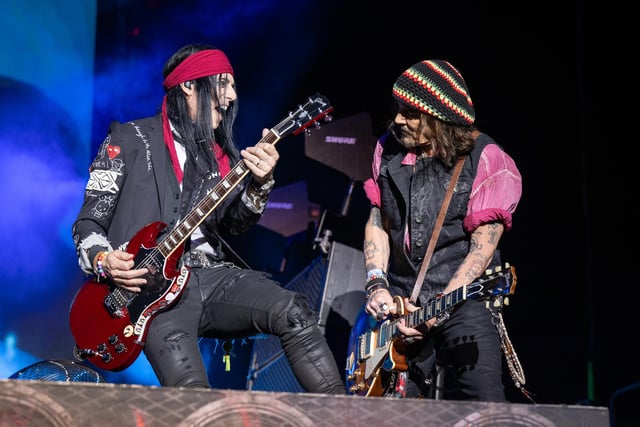 Hollywood Vampires members Tommy Henriksen and Johnny Depp on stage at the Utilita Arena in Birmingham on Tuesday, July 11, 2023. Photo by David Jackson.