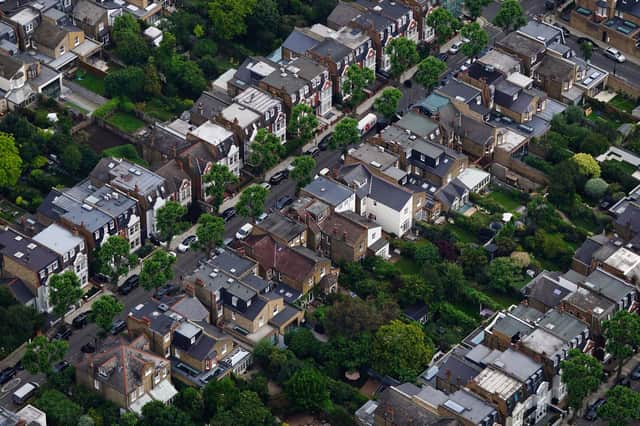 File photo dated 09/07/21 of an aerial view of terrace houses in west London. More than 1.4 million households are facing the prospect of interest rate rises when they renew their fixed-rate mortgages this year, according to the Office for National Statistics (ONS). The majority of fixed-rate mortgages in the UK (57%) which are coming up for renewal in 2023 were fixed at interest rates below 2%, it said. Issue date: Monday January 9, 2023.